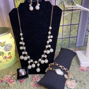 Complete Pearl Necklace Set includes: Necklace, Bracelet, Ring, Earrings.